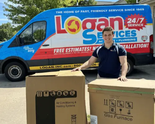 Logan Services installer with company van at a residential job site